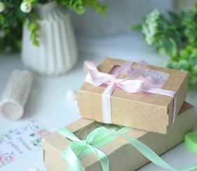 Wrapping a Gift Box, by Shirley George Frazier. All rights reserved. Photo by Kristina Umaeva: https://www.pexels.com/photo/gifts-boxes-with-ribbons-7410461/